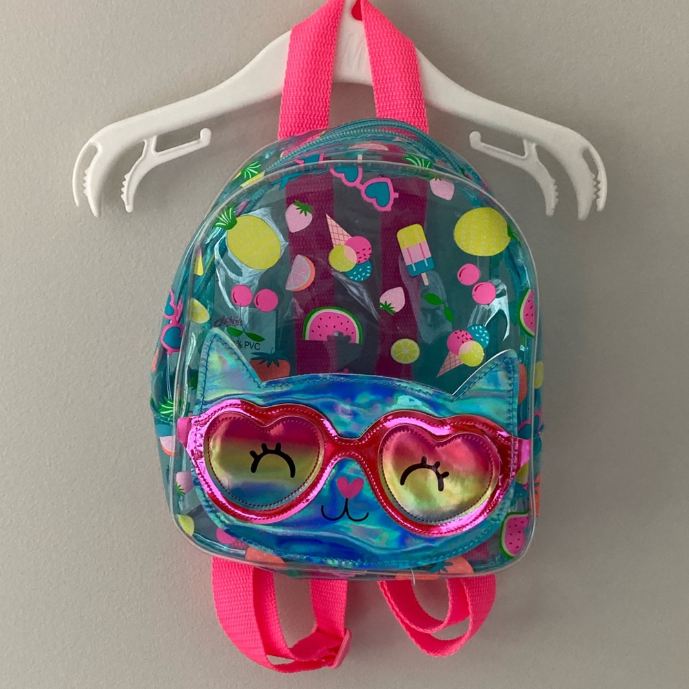 Claire’s Plastic Cat Backback with Fruit Pattern